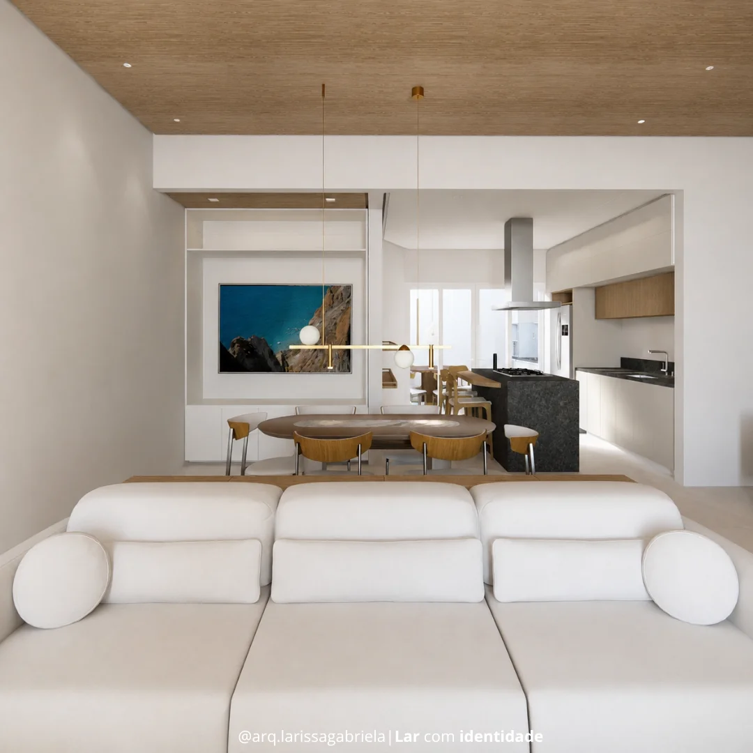 Living integrado com cozinha e sala de jantar em casa de investimento